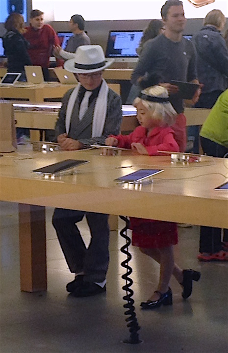 Halloween 2015 is officially behind us, but I still want to offer this photo. On Saturday, Melinda & I took Celeste to University Village to see all the cute little kids in their adorable costumes. I spotted these two time travelers inside the Apple Store.