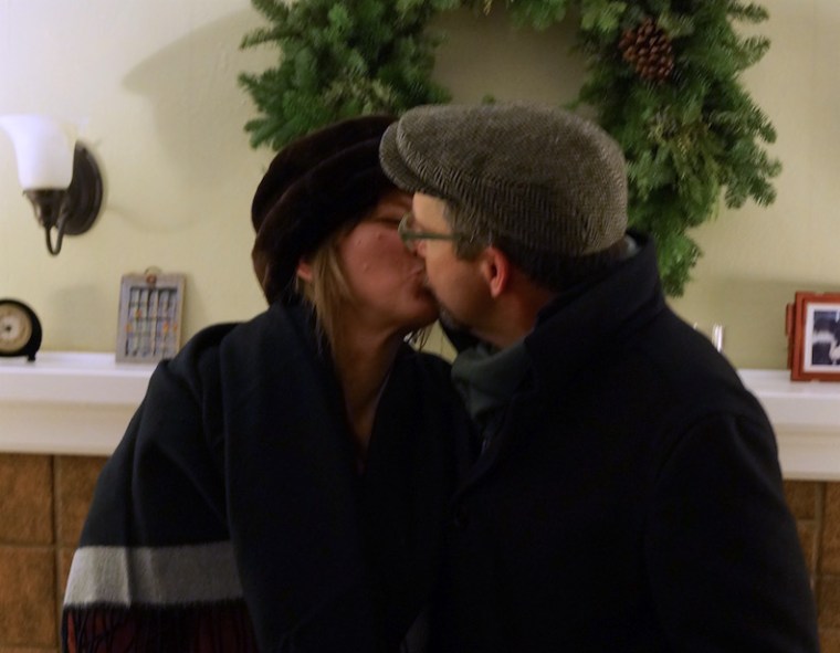 A smooch to kick off the next 25 years.