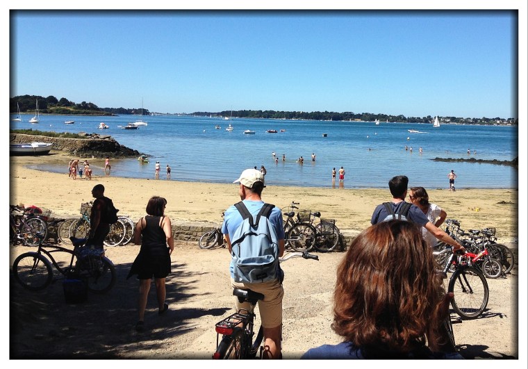 Arriving at one of the beaches by bike. That's Laurent with the white hat. 