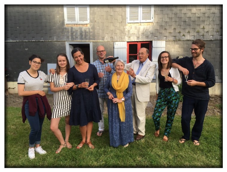 Back at home, here is the Bertail family (minus Theo and plus a cousin named Manon on the left). Yes, this is the full picture from which I cropped the silly M. Bertail pretending to pour champagne on his unsuspecting wife's head. Before the night was out, M. Bertail had shared with me a taste of some very old, and very delicious, Calvados. What a treat! And in a future post I will tell you about Madame Bertail and her painting of icons. 